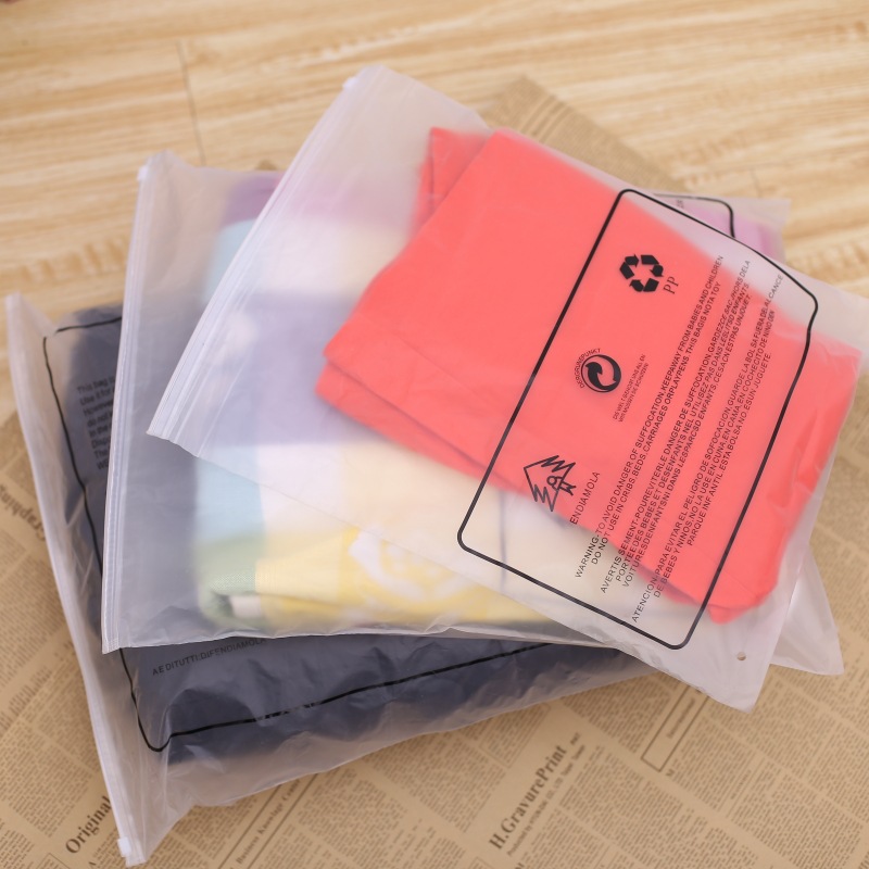 现货 背面印通用警语拉链袋 环保标语包装服装袋 外贸产品包装袋